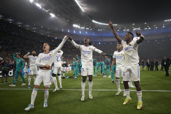 Real Madrid players celebrate.