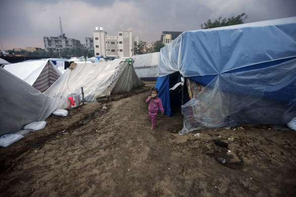 A displaced Palestinian child amid tents in the town of Khan Younis.