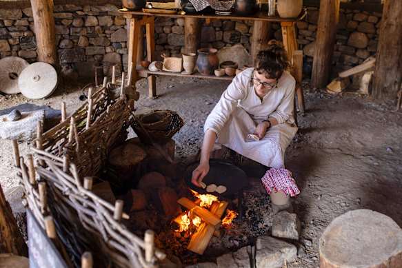 At the immersive Crannog Centre, Iron-Age skills like baking are on show for visitors.