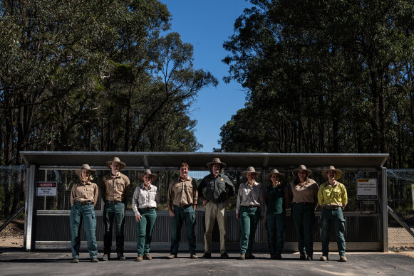 NSW National Parks and Wildlife Service staff at the gates to Yiraaldiya National Park in Shanes Park.