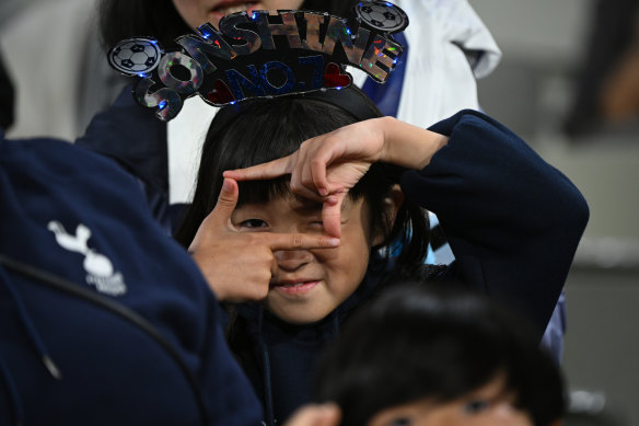 A young Son Heung-min fan does the player’s “take a picture” goal celebration.