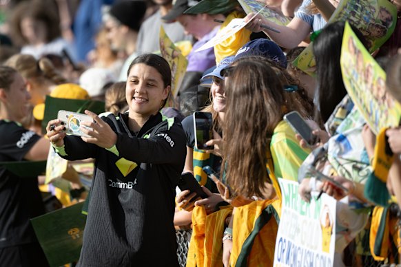Sam Kerr takes a selfie with a Matildas fan at Leichhardt Oval on Tuesday.