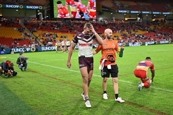 Oh no, not again: Tom Trbojevic leaves the field after suffering a hamstring injury.