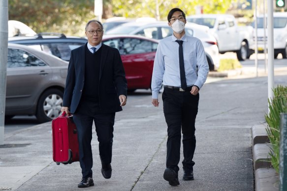Eric Wong, right, arrives at the court on Wednesday morning before being sentenced to 14 months’ jail.