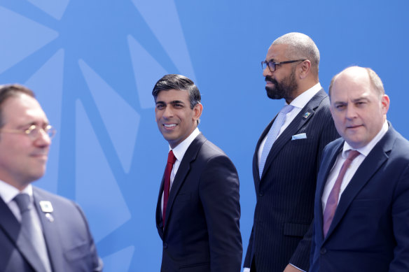 British Prime Minister Rishi Sunak, Secretary of State for Foreign, Commonwealth and Development Affairs James Cleverly and Secretary of State for Defence Ben Wallace arrive on the first day of the 2023 NATO Summit in Vilnius, Lithuania. 