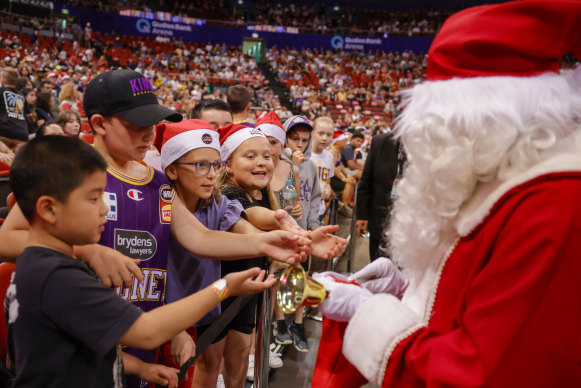 Young fans embrace the festive spirit during the NBL’s foray into Christmas Day scheduling.