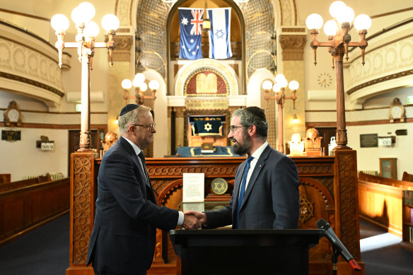 Australian Prime Minister Anthony Albanese (left) and Rabbi Yaakov Glasman shake hands during a visit to the St Kilda Shule in Melbourne.