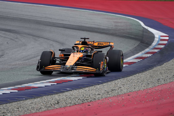 McLaren driver Oscar Piastri en route to the podium at the Austrian Formula 1 Grand Prix at the Red Bull Ring racetrack in Spielberg on Sunday.