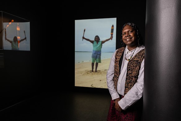 Telstra Multimedia Award winner Colin Heenan-Puruntatameri with his work <i>Ngirramini Ngini Amparruwu (The Story of the Widow)</i>