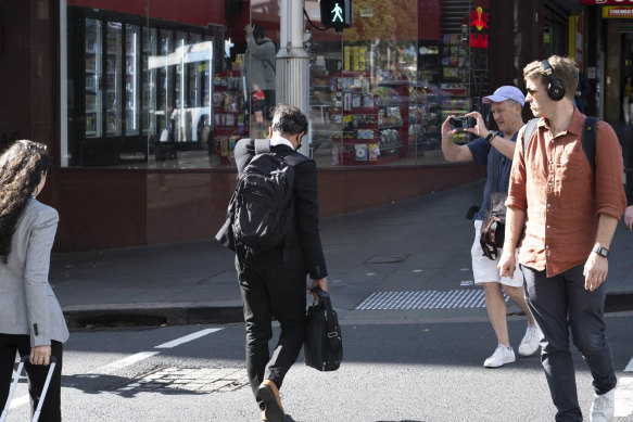 Balesh Dhankhar leaves the Downing Centre after another day of his sexual assault trial in Sydney. 