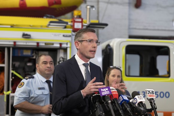 NSW Premier Dominic Perrottet speaks at the SES headquarters in Sydney today.