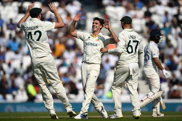 Pat Cummins celebrates the wicket of Cheteshwar Pujara.