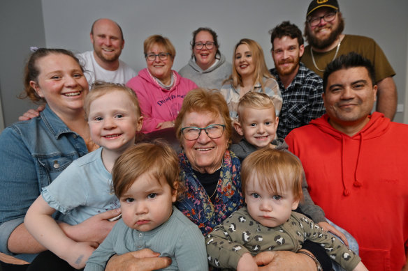 Joan Graham with some of her biological children and former foster children and their offspring.