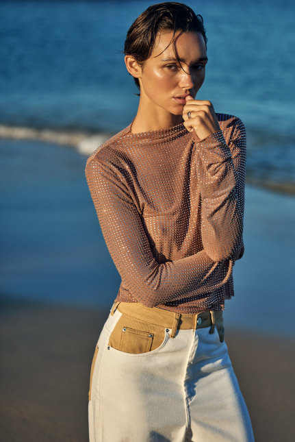 Deering “Sparkles” top, $350, and jeans, $290.
