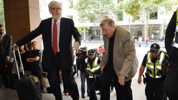 Robert Richter QC and Cardinal Pell arrives at the Melbourne Magistrates Court last week.