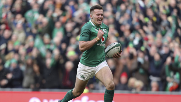 Cruising: Ireland's Jacob Stockdale runs in to score their fifth try.