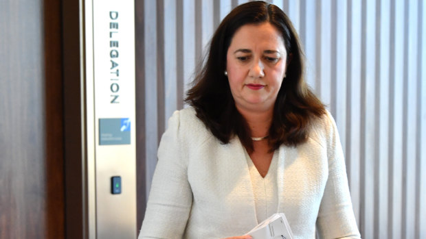 Annastacia Palaszczuk has been forced to defend her partner's role in the Adani loan approval process.