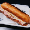 Loulou’s baguette has triangles of sliced gruyère on both sides of the roll, a sensible thickness of thinly sliced ham and lots of house-made butter.