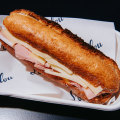 Loulou’s baguette has triangles of sliced gruyère on both sides of the roll, a sensible thickness of thinly sliced ham and lots of house-made butter.