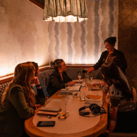 Nab a table at the cosy restaurant.