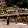 A person has died in a suspected diving incident at Shelly Beach in Manly.