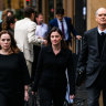 Former Super Retail Group chief legal officer Rebecca Farrell (left), former company secretary Amelia Berczelly (centre) and their lawyer Michael Harmer have a legal battle against the retailer.