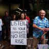Protesters gather outside the Northern Beaches Council meeting.