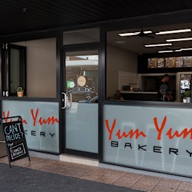 The exterior of Yum Yum Bakery.