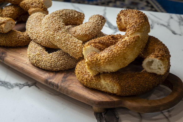 Stacks of simit, a sesame-studded bread ring that is a popular Turkish street food.