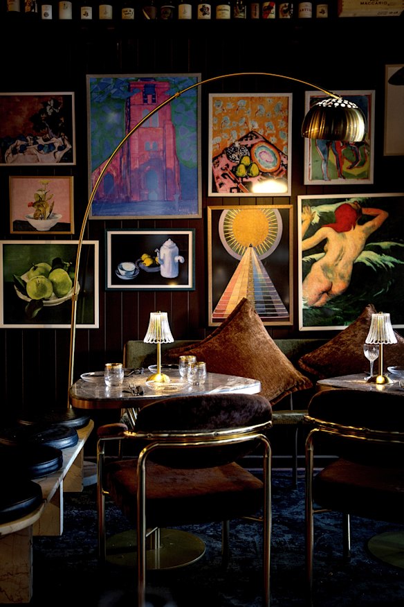 The moody, art-filled space was previously a photography studio.