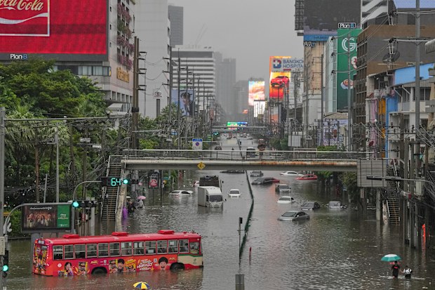 The streets are flooded after heavy rain in Bangkok, Thailand, Saturday, Sept. 26, 2026
