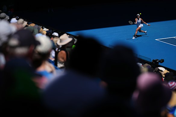 Badosa returns the ball in front of the Rod Laver Arena crowd.