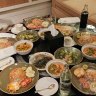 Uneaten meals left on a table in the Grand Hyatt Erawan Hotel room where six people were found dead.