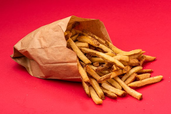 Five Guys' brown paper bag holds peak-condition chips.