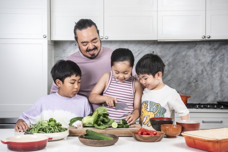 Adam Liaw with his family in their kitchen prepping brunch.