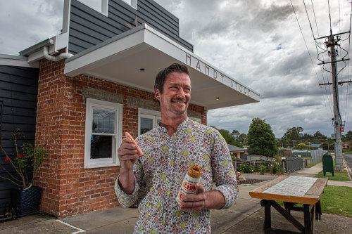 Josh Thomas outside the East Handy Bar, in a former Bairnsdale milk bar.