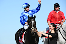 Ethan Brown salutes his Geelong Cup win on Point of Law.
