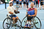 Dylan Alcott and winner Sam Schroder with their trophies after the final.