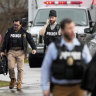 Police outside the Abundant Life Christian School following a shooting in Madison, Wisconsin. 