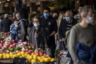 Shoppers with masks at South Melbourne Market as Melbourne’s COVID-19 restrictions continue. 