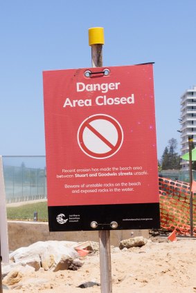 One of the signs along Collaroy Beach was removed Tuesday after a media inquiry to Congress.