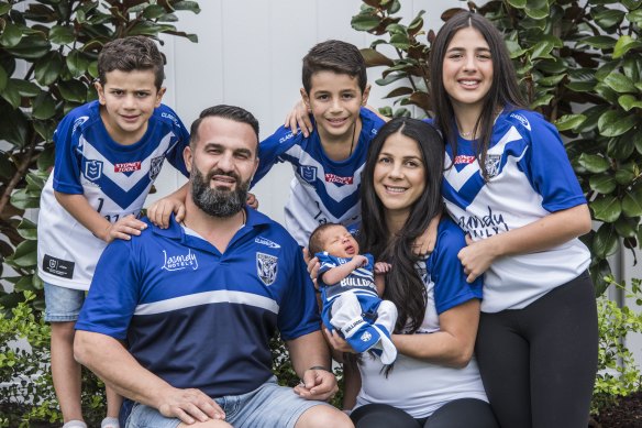 Bulldogs fan Danny Abdallah with wife Leila and children Alex, Michael, Liana and baby Selina at home on Saturday.