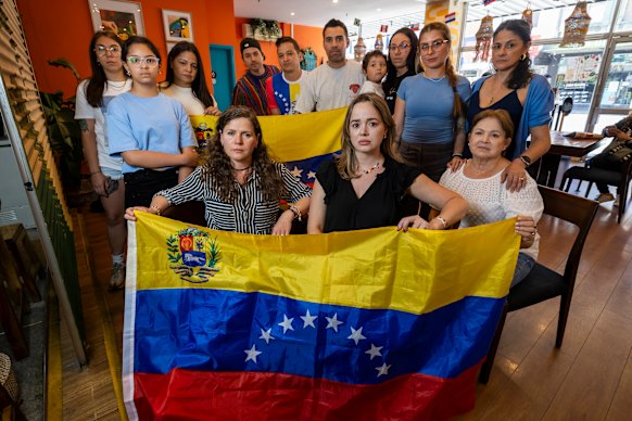 Venezuelan-Australians gather in a Melbourne restaurant to celebrate the ousting of Nicolas Maduro.