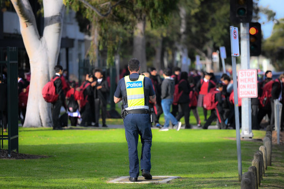 Police patrol outside Caroline Chisholm Catholic College in Braybrook on Tuesday.