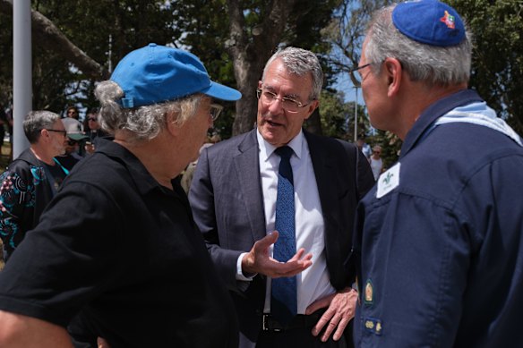 Labor MP Mark Dreyfus (centre) at Bondi Beach the day after the massacre. 
