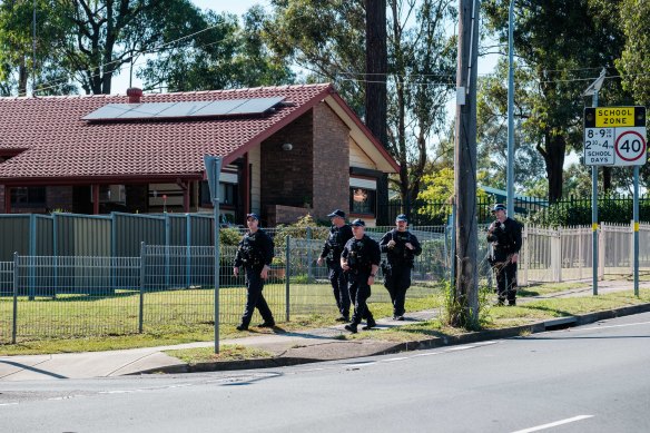 Police detectives and the riot squad were out in force in Doonside on Saturday.