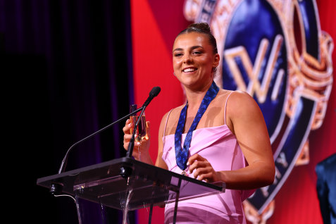Marinoff accepts the W Award.