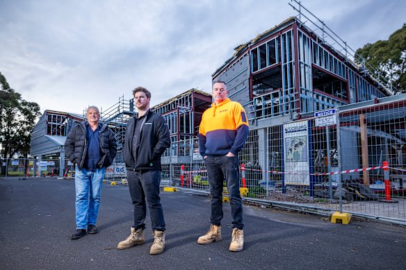 Aaron Lanfranchi with fellow tradesmen Chris Richardson and Anthony Richardson at the Coburg High School worksite.