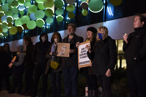 People gathered outside Perth Children’s Hospital for a vigil in support of the Murugappan family.