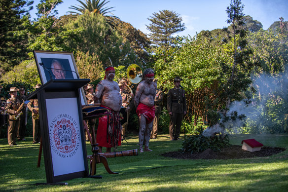 A smoking ceremony at the coronation tree planting at Government House.
